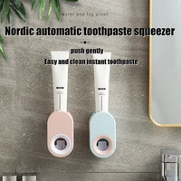 tcmhealth automatic toothpaste squeezer bathroom wall mounted punch free macaron toothbrush holder