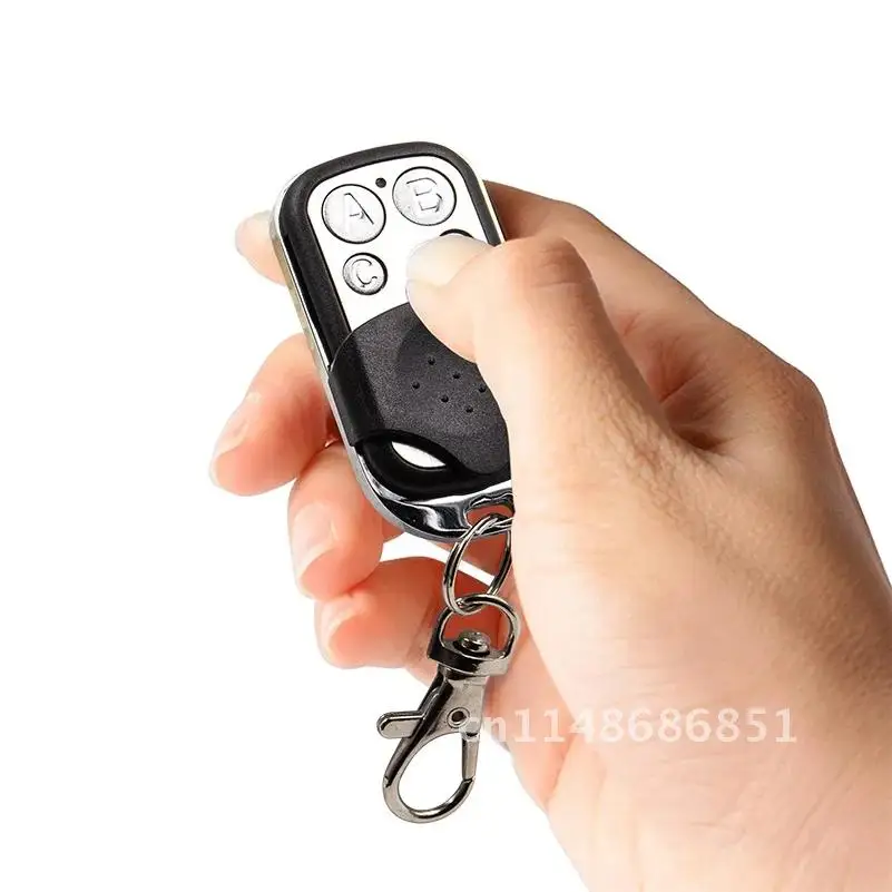 Универсальный пульт дистанционного управления для ворот гаража 433 МГц 4 кнопки 1