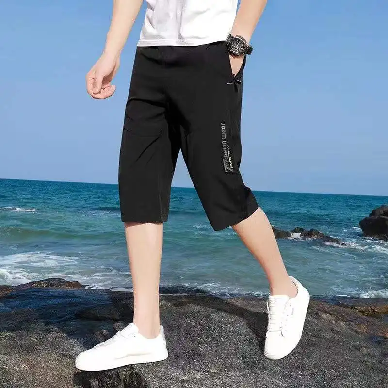 

Cropped Pants Men's Summer Thin Section Loose Ice Silk Outer Wear Casual Sports Trend Summer Breeches Large Size Men's Shorts