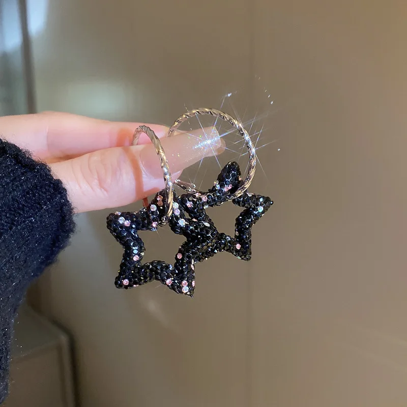 

New silver need diamond black star statement earrings