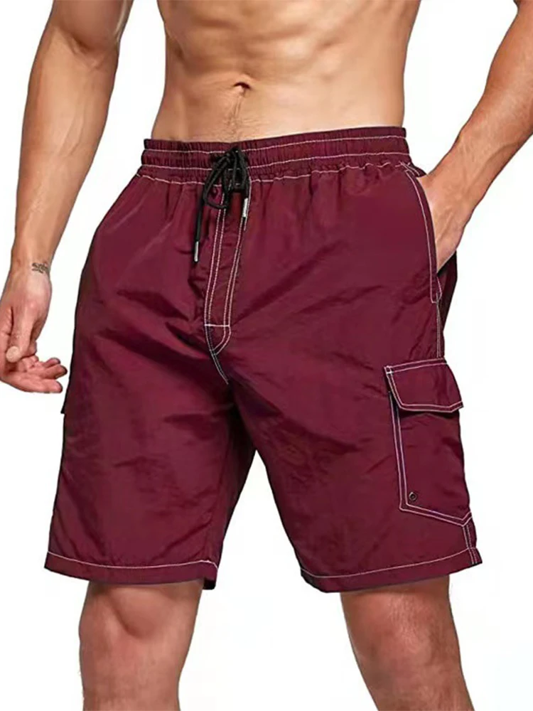 

Брюки-карго мужские с несколькими карманами, модные однотонные летние шорты, повседневные дизайнерские Короткие штаны со средней талией, у...