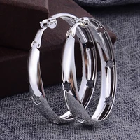 anglang hiphop stylish hoop loop earrings silver color available women earrings girls hyperbole wholesale lotsbulk