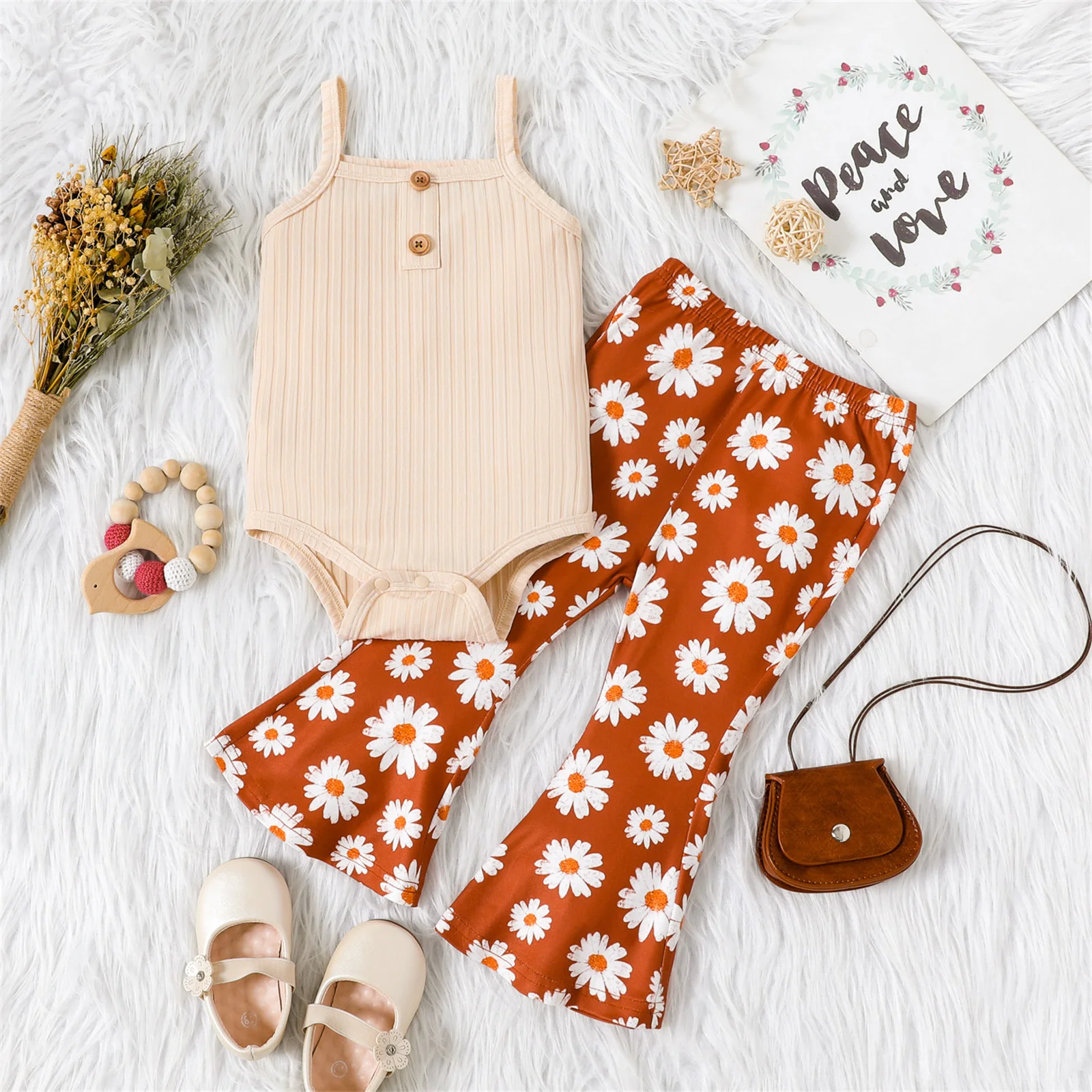 

PatPat 2pcs Baby Girl Ribbed Spaghetti Strap Romper and Allover Daisy Floral Print Flared Pants Set New Born Summer Clothing