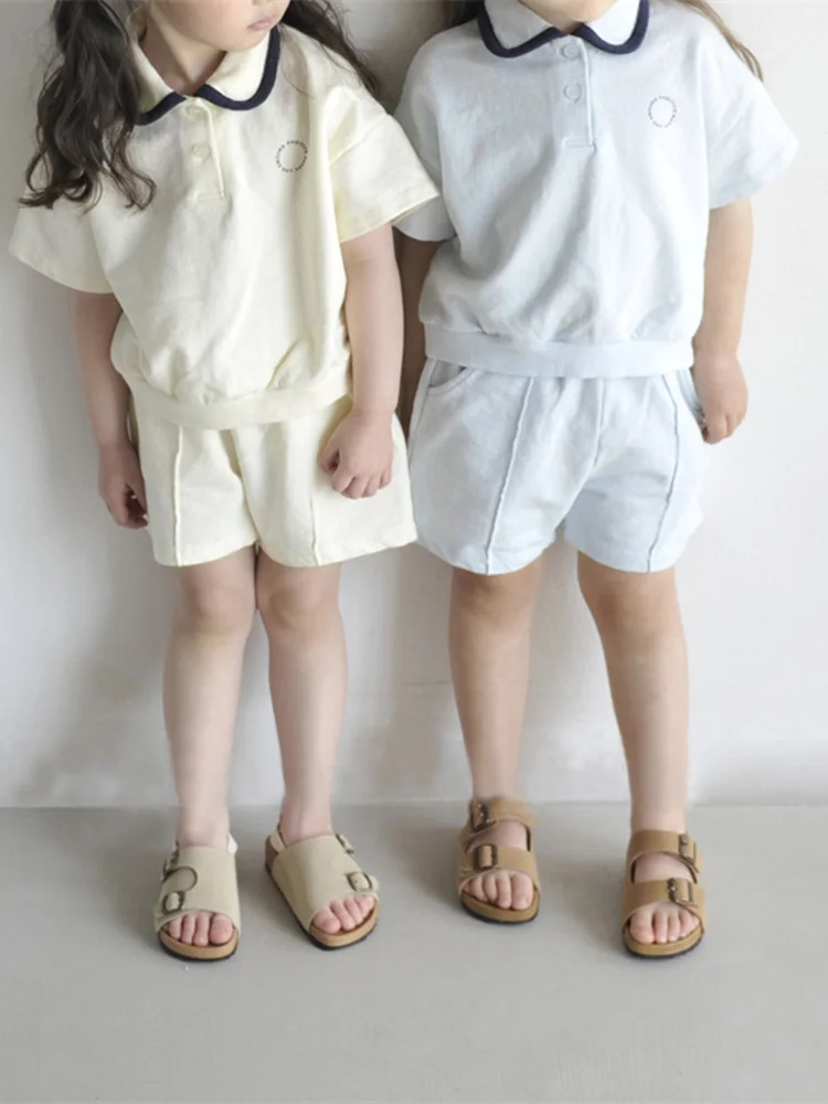 

Korean Version of Children's Summer Clothes New Suit Boys and Girls Fashion Lapel Short-sleeved T-shirt Shorts Two-piece Set