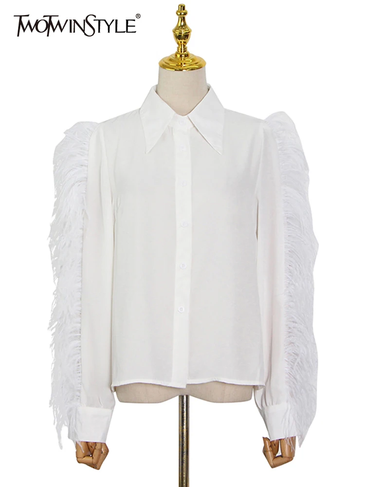

TWOTWINSTYLE White Casual Shirt For Women Lapel Collar Long Sleeve Feathers Single Breasted Blouses Female Summer 2022 New Style