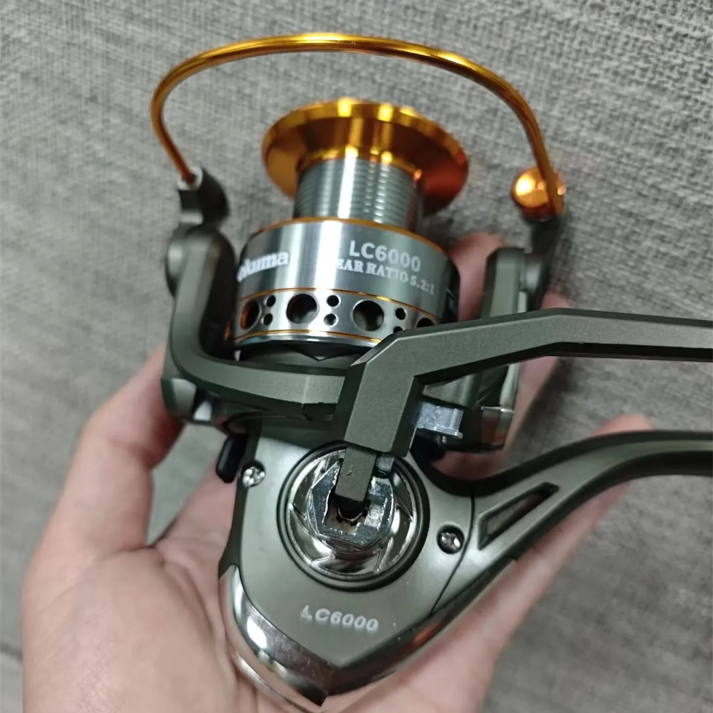 Фото Высокоскоростная рыболовная спиннинговая катушка Okuma 5.2:1, антикоррозийная, для морской и пресной воды, с передним и задним фрикционом, нагрузка до 10 кг №4