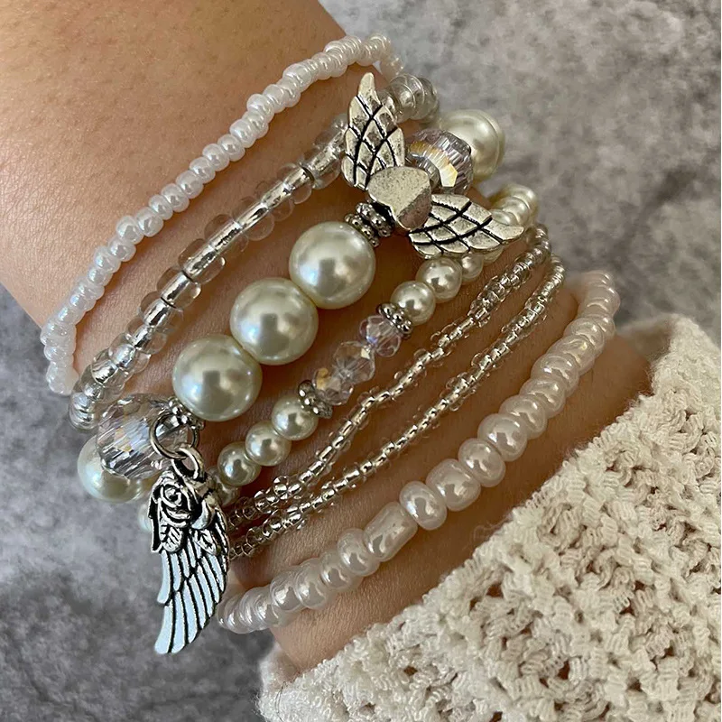 

2022 New Love Pearl Wings Bracelet Set 7 Pieces Rice Beaded Beaded Ladies Bracelet Jewelry Gift