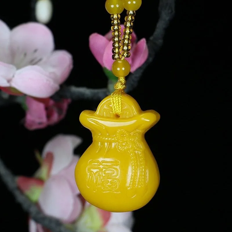 У Huanglong Jasper имелся раньше от поколения до мужские и женские ожерелья с монетами