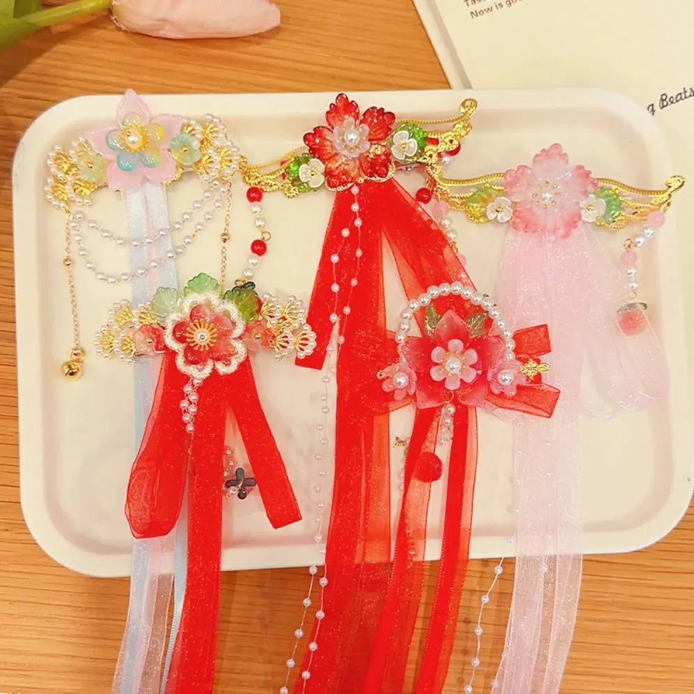 

Заколка для волос с цветочным орнаментом и кисточкой