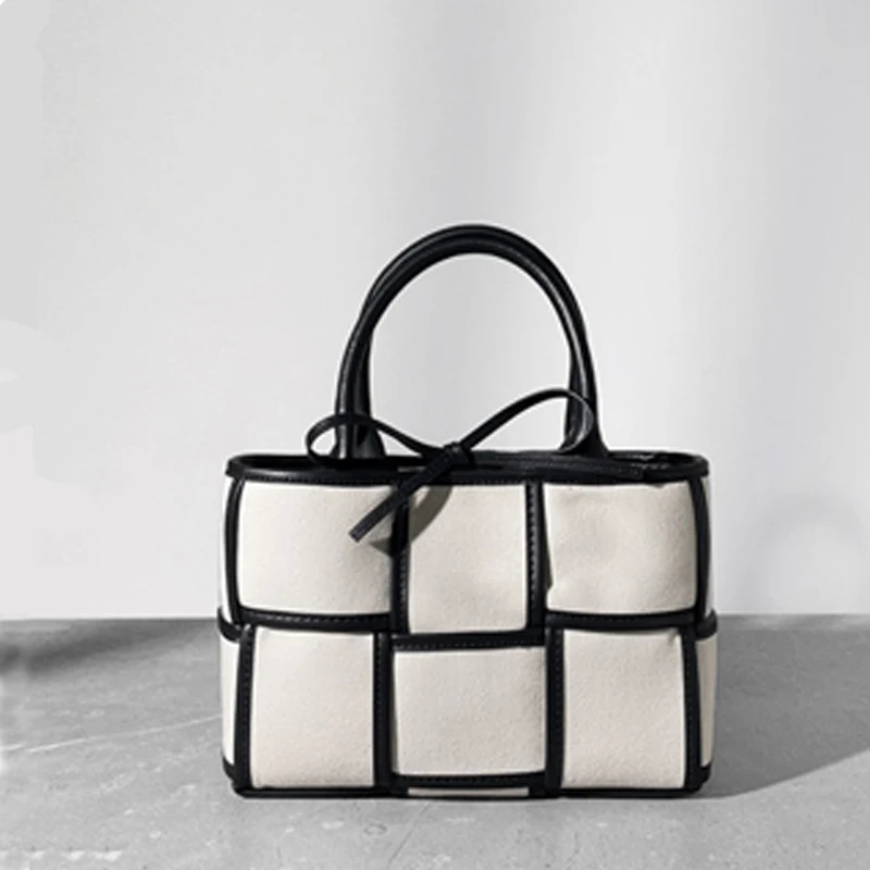 

2023 New niche design for commuting canvas bag, contrasting woven handbag, cowhide one shoulder crossbody women's bag