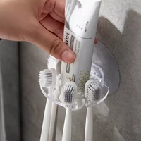 self adhesive wall mount toothpaste dispenser toothbrush holder storage squeezer shaver holder bathroom shelves
