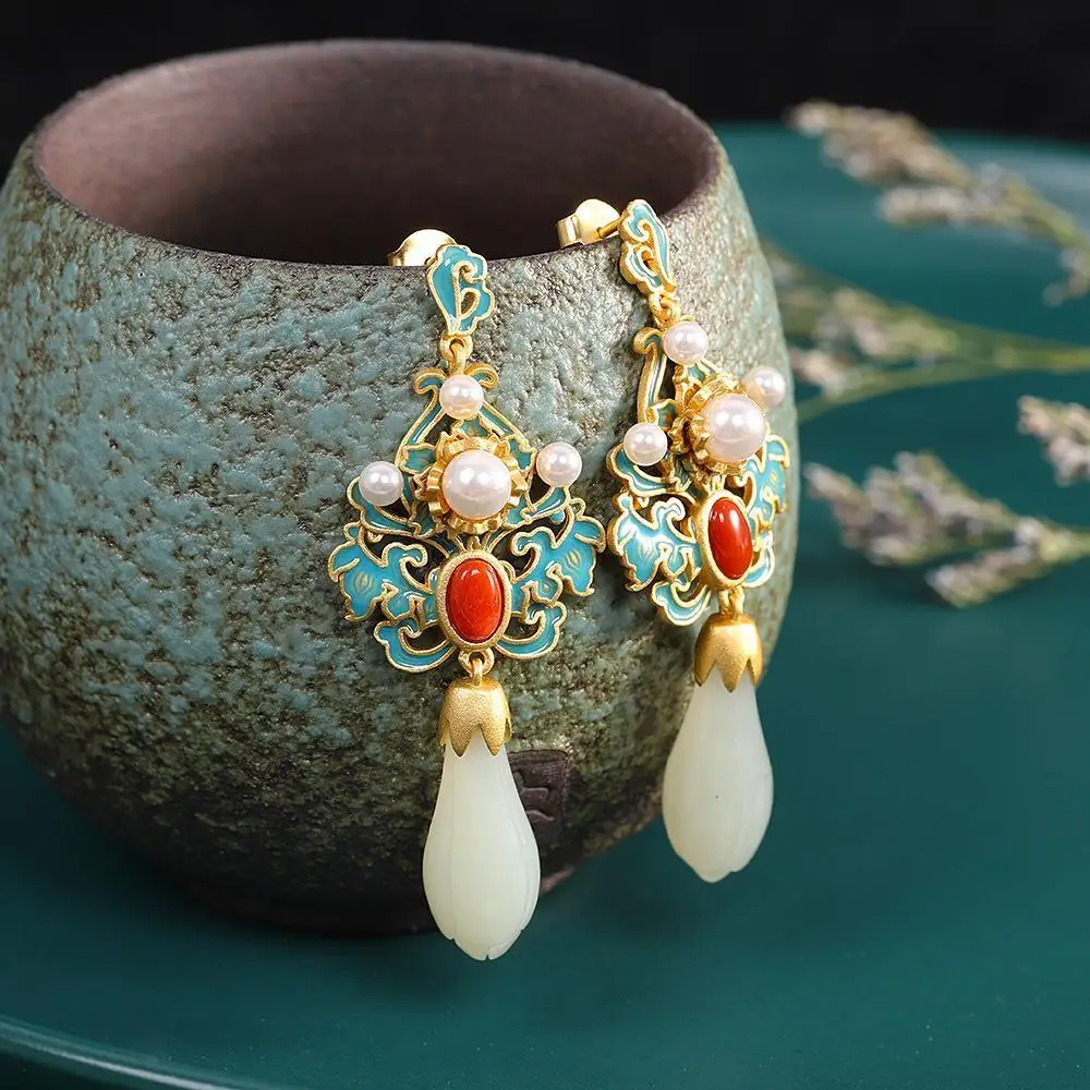 

Серьги с эмалью в виде цветка магнолии