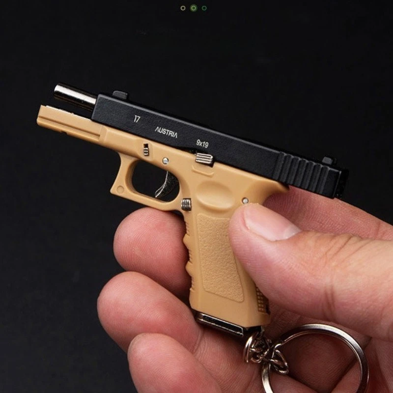 Фото Новая мини-пистолет G17 в штучной упаковке 1:3, модель полусплавного брелка, съемная декомпрессионная игрушка, 5 пулей, всплывающий мужской подарок №2