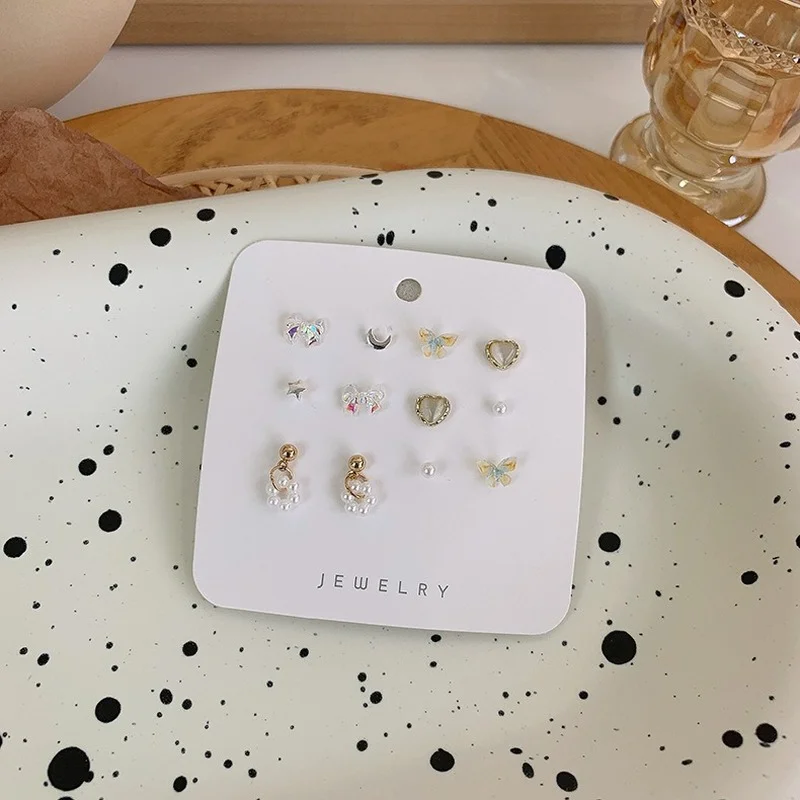 

U-Magical Minimalist Bowknot Heart Butterfly Metallic Stud Earring for Women Imitation Pearl Opals Star Moon Earring Jewelry