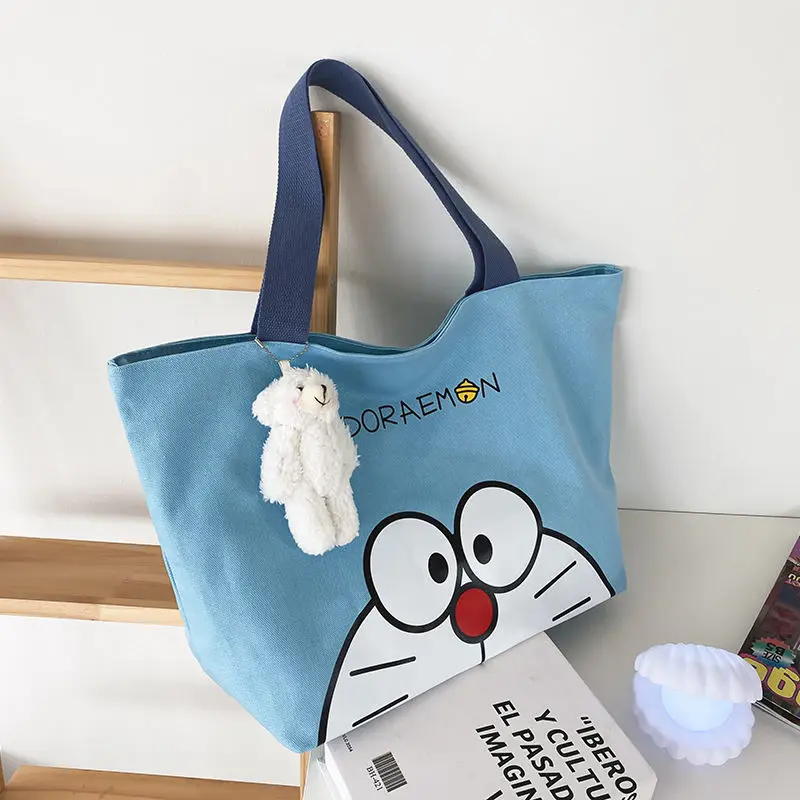 

Doraemon Machine кот девушки мультфильм милый большой емкости ручной студент фотография