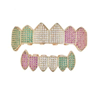 hip hop teeth grillz iced out aaa pink color zircon fang mouth teeth caps top bottom tooth set men women grills jewelry