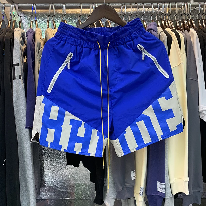 

Casual RHUDE Shorts Men Women High Quality Black Blue Green Drawstring Zipper Pocket Inside Mesh Splice Loose Rhude Breeches