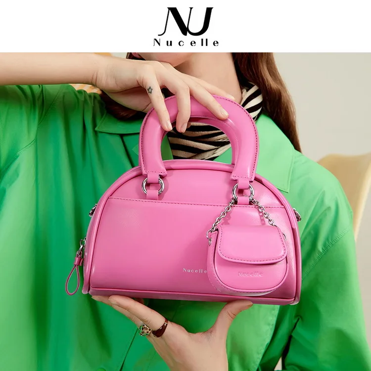 

Handbags: minority designed bowling bags (Crossbody bags for women purses and handbags)