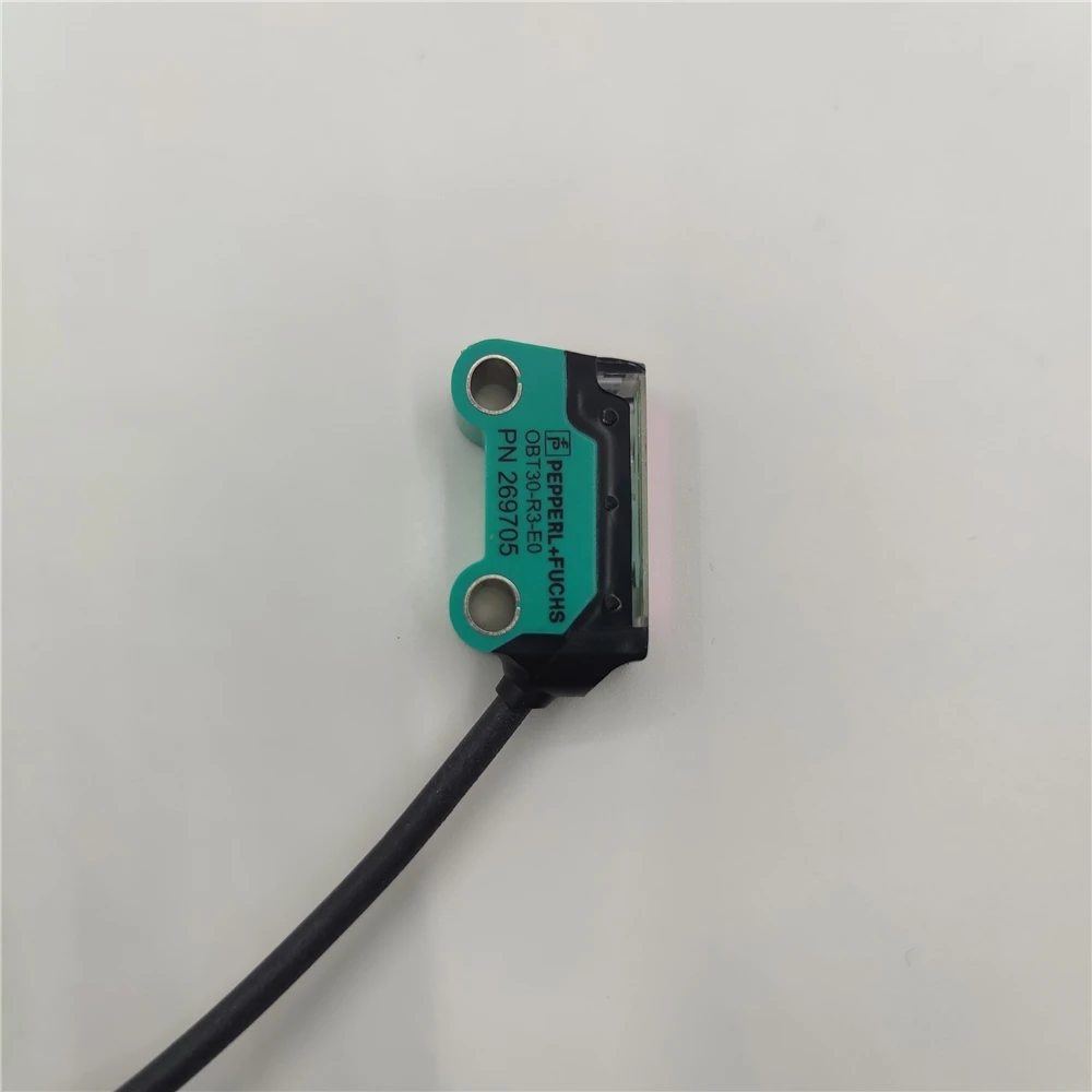 Фотоэлектрический датчик с функцией подавления заднего фона