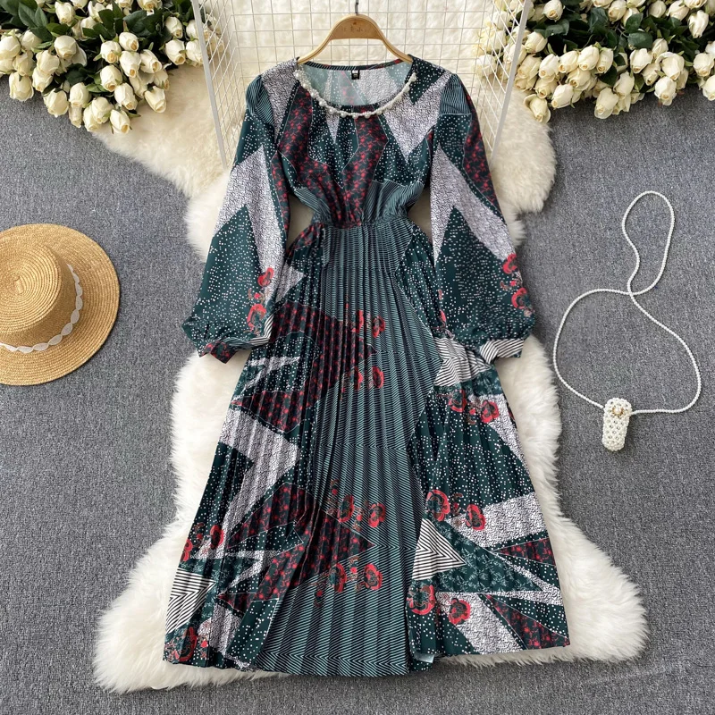 

Плиссированное Платье средней длины с круглым вырезом и принтом