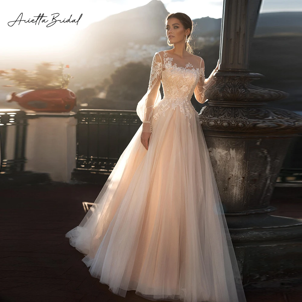 

Arietta Long Puff Sleeves Beach Wedding Dresses Sheer Neckline Appliqued A-Line Bride Dresses Lace Up Back Tulle Wedding Gowns