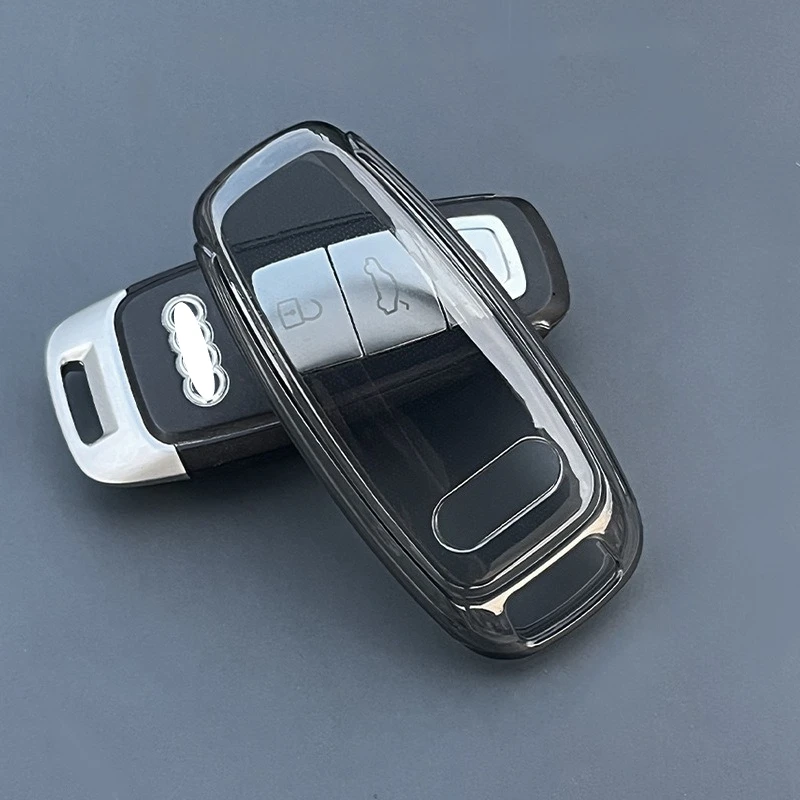

Мягкий чехол для ключей из ТПУ для AUDI A3/A4L/A6/A7/A8/Q3/Q5/Q7 — дымчатый черный/прозрачный