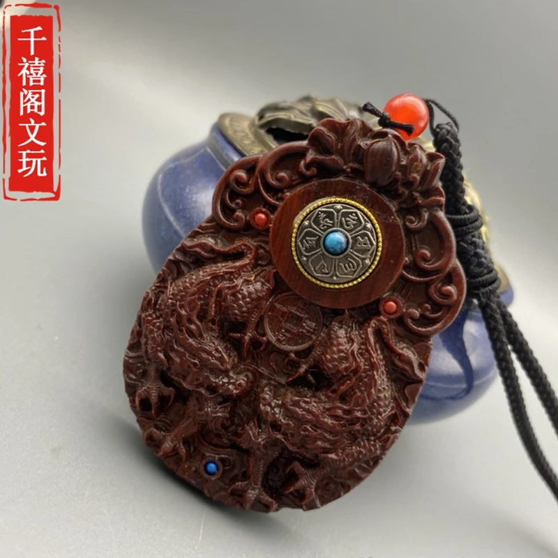 

Blood sandalwood carved six character mantra Double Hook Pendant men and women Wooden ornament pendant peace pendant figurine