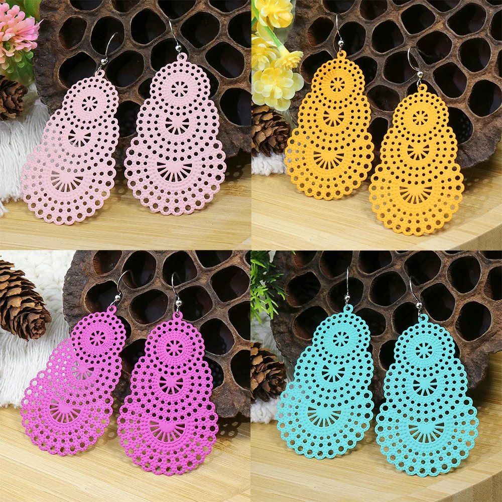 

Fashion Creative Hollow Metal Earrings for Women Femininity Geometric Round Flowers Candy Color Earrings Wholesale