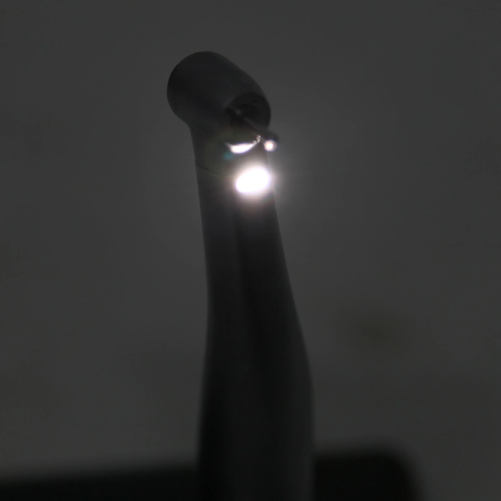 Стоматологический фрикционный наконечник для распыления красных колец