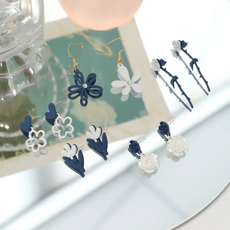 

2021 new silver needle Klein Blue contrast asymmetric hollowed out Flower Earrings ins wind White Rose Heart Earrings Jewelry