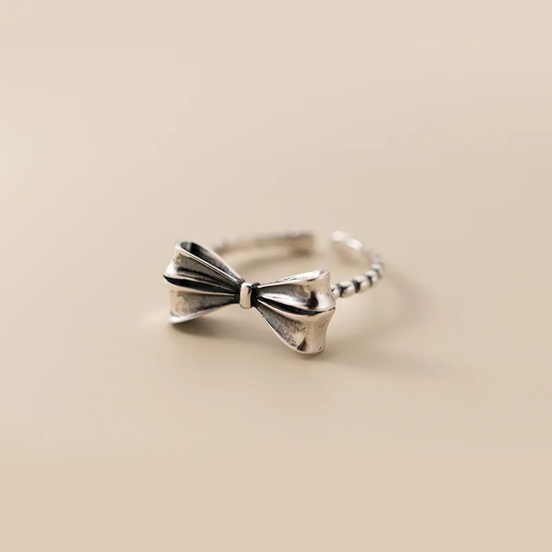 

New women's retro silver bow open adjustable ring fashion trend jewelry gift R176