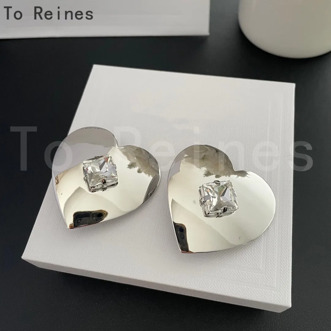 Женские серьги-клипсы в форме сердца с кристаллами