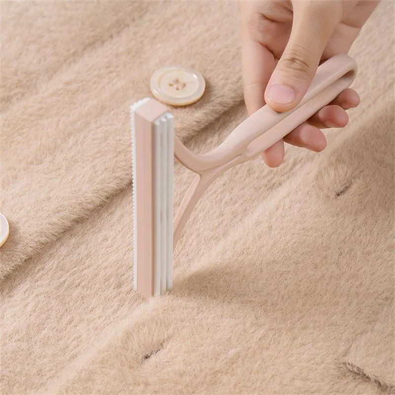 

Ручной скребок для удаления волос с одежды