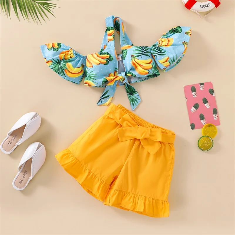 

2-7Y Fashion Children Girls Clothing Sets Summer Toddler Kids Off Shoulder Banana Pattern Crop Tops+Bowknot Ruffles Shorts 2pcs