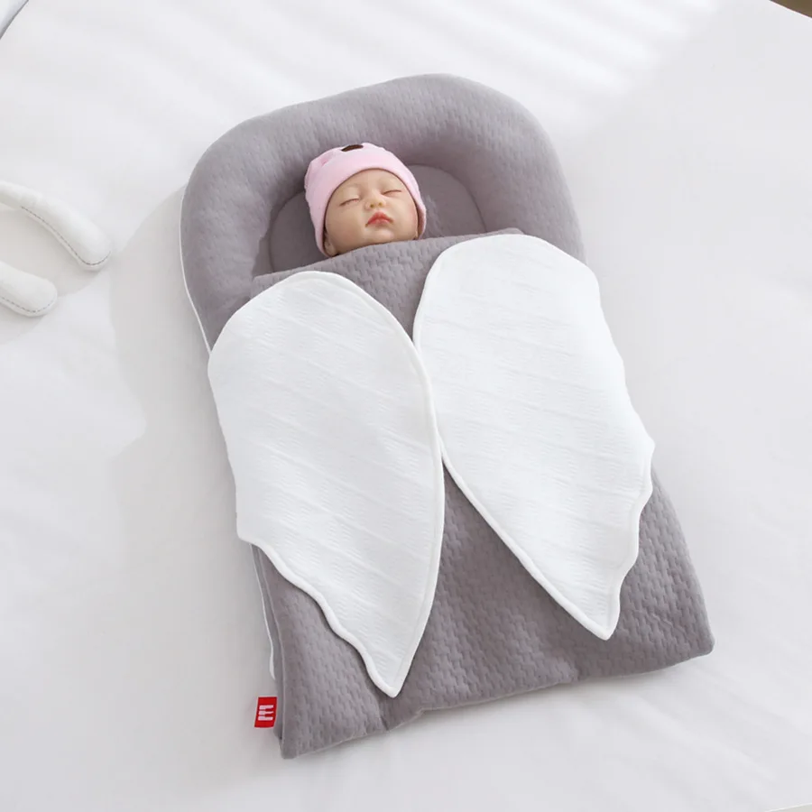 

Portable Baby Nest Bed Newborn Lounger Swaddle with Blanket Wrap Sleeping Wing Co- Sleeper Kid Bassinet for 0-12 Months