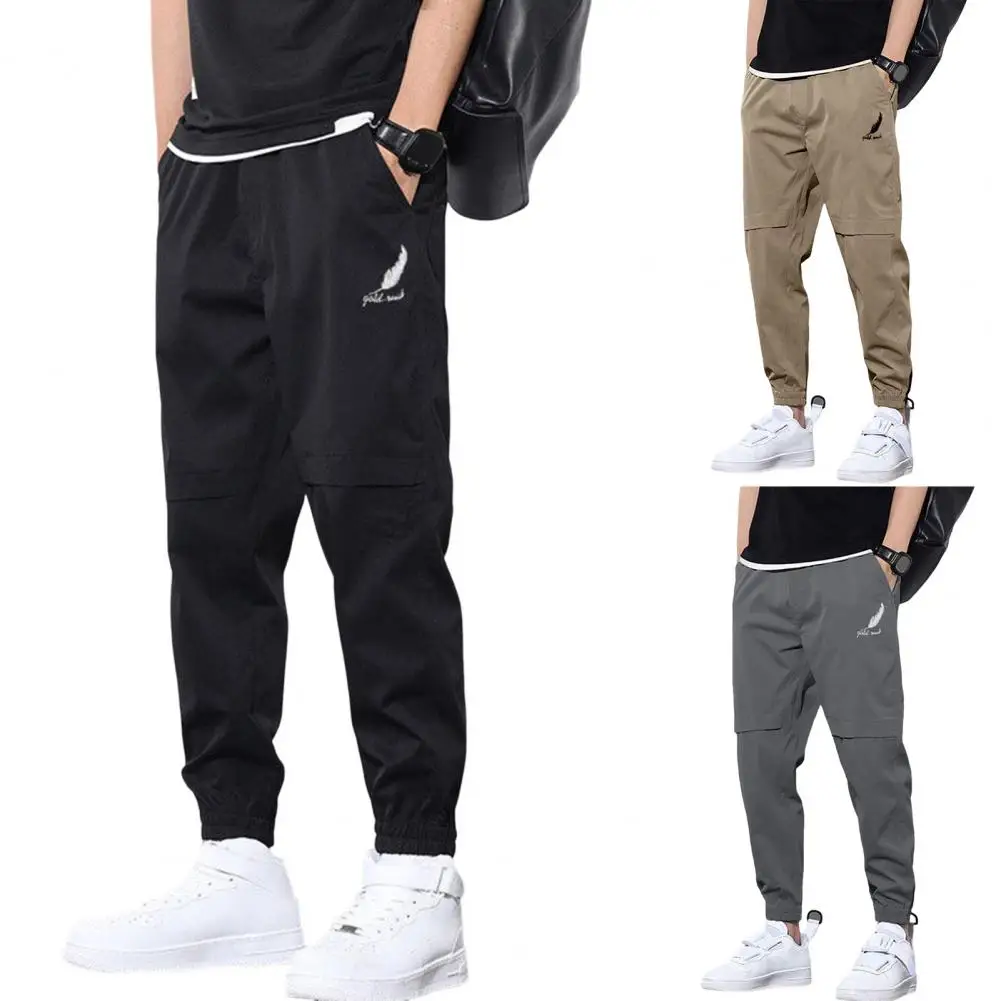 

Men Joggers Cargo Pant Mid-Rise Waist Elastic Waistband Logo Print Pockets Sport Trouser Solid Color Casual Sweatpant Streetwear