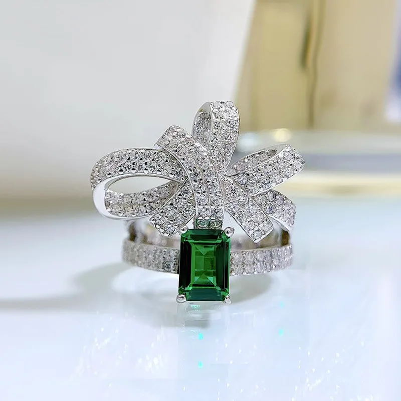 

European and American fashion temperament bow ring 925 silver female emerald 5*7 new personality design