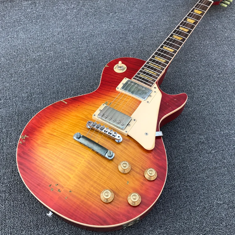

Cherry Sunburst Relic Electric Guitar, Yellowish Inlays, One piece Body and Neck, TonePro Bridge, Flame Maple, Old Aged Guitarra