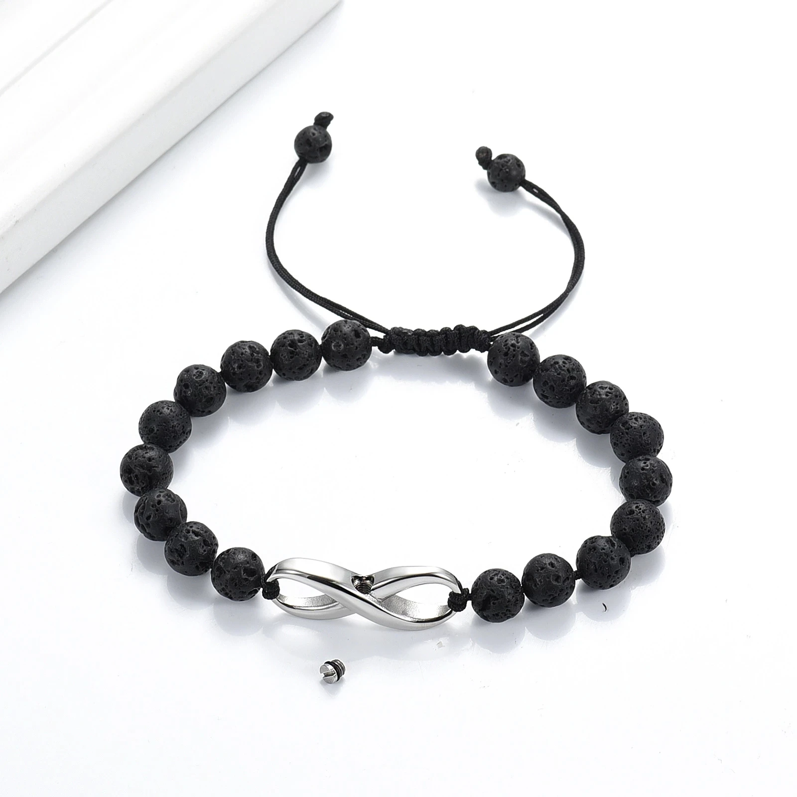 

Браслет-урна для кремации из нержавеющей стали с камнем-лавой