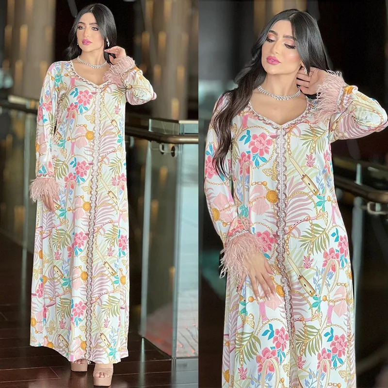 Muslim women's dress Jarabya Dubai hot diamond print V-neck long sleeve feather panels loose Abayas dress جديد في فساتين