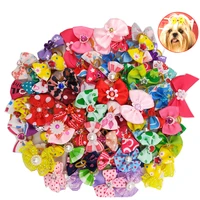 20 pcslothot pet bow head flower cat and dog headdress leather band pet accessories wholesale spot