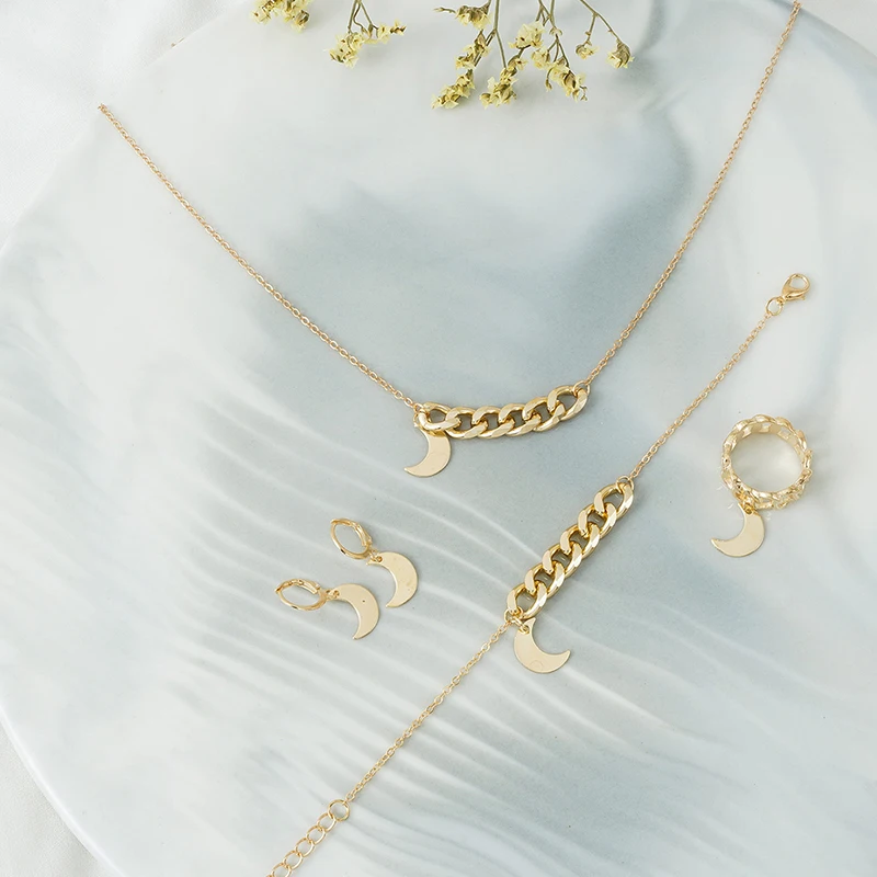 Женский комплект из колье серёг браслета и кольца