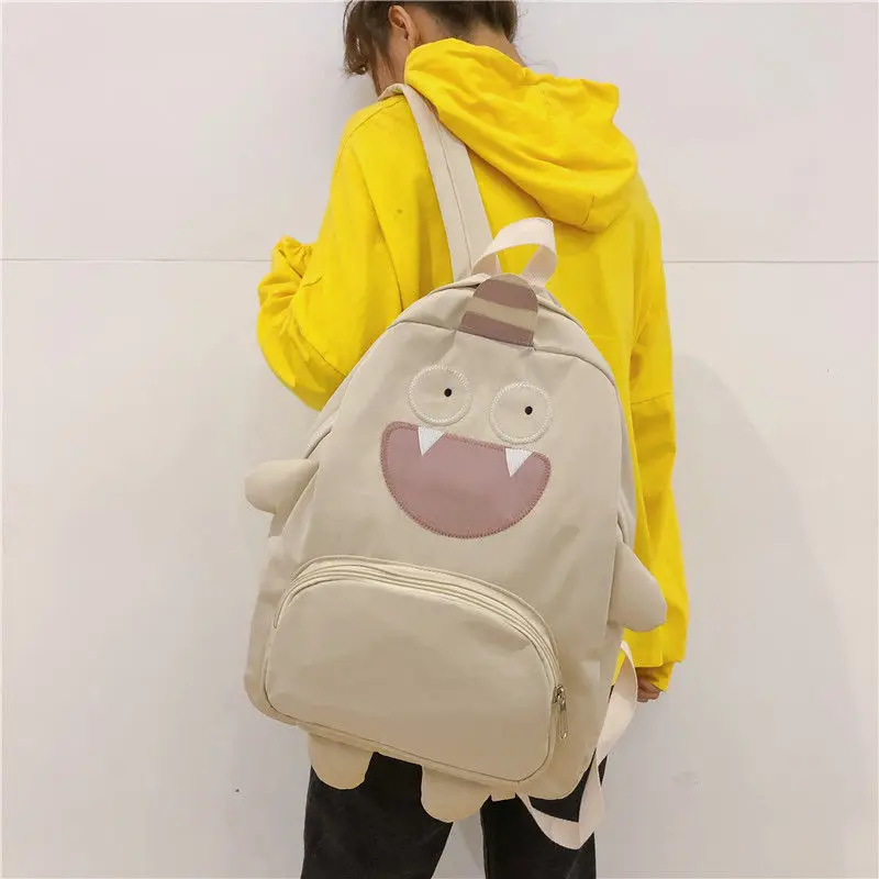

Cartoon little monster frog chick backpack for women 2021new Kawaii girl student school bags Nylon cute animal Travel backpacks
