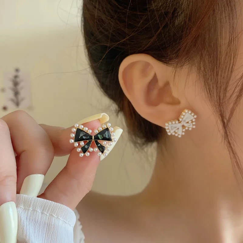 

Japan and South Korea fashion sweet feeling ins wind Earrings French small fragrance bow Pearl Earrings for women free shipping