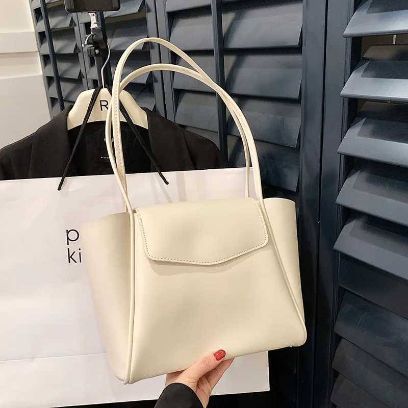 

Texture Niche Large Capacity Tote Bag for Women 2023 New Fashion Student Commuting Bag, Portable Shoulder Bag