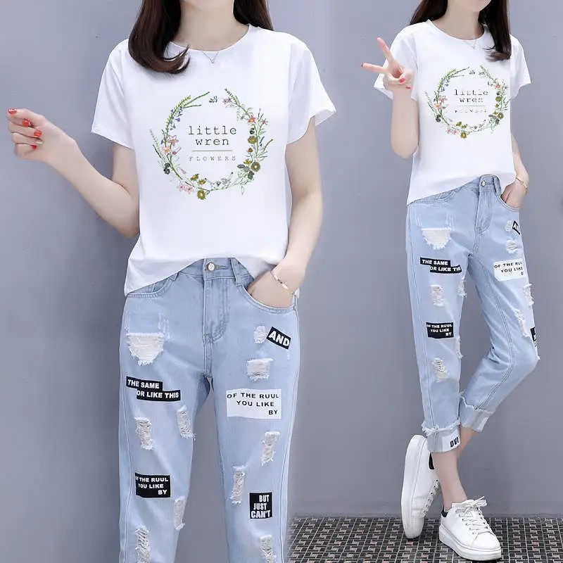 

Womens Summer Two-piece 2022 New Short-Sleeved T-Shirt + Ripped Nine-Point Jeans Two-Piece Female Student Cowboy Pants Suit 3XL