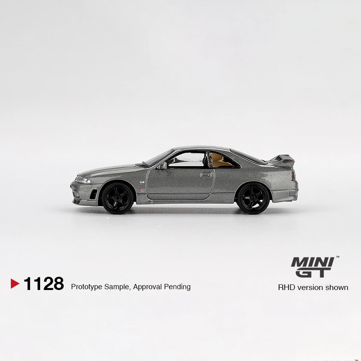 Фото В наличии, готов к отправке: MiniGT 1128 1:64 Nissan Skyline GT-R R33, металлик, темно-серый, праворульный, литая модель автомобиля # 1128 №4