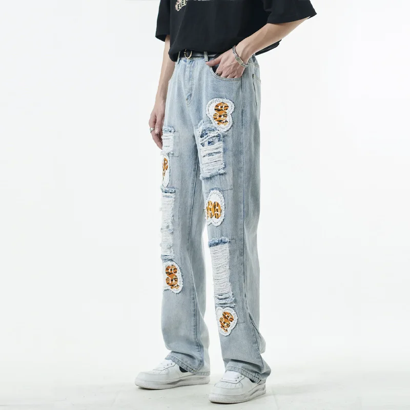 Men's Four Seasons Trousers American High Street Trend Hole Patch Men and Women with The Same Style Denim Trousers Ins Hot Sale