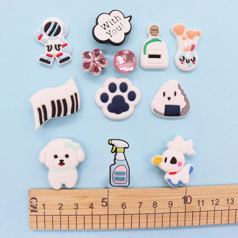 

1Pcs PVC Dog Footprint Onigiri Brush Baby Shoe Buckle Charms for Croc Jibz Dress Astronauts Accessories DIY Backpack
