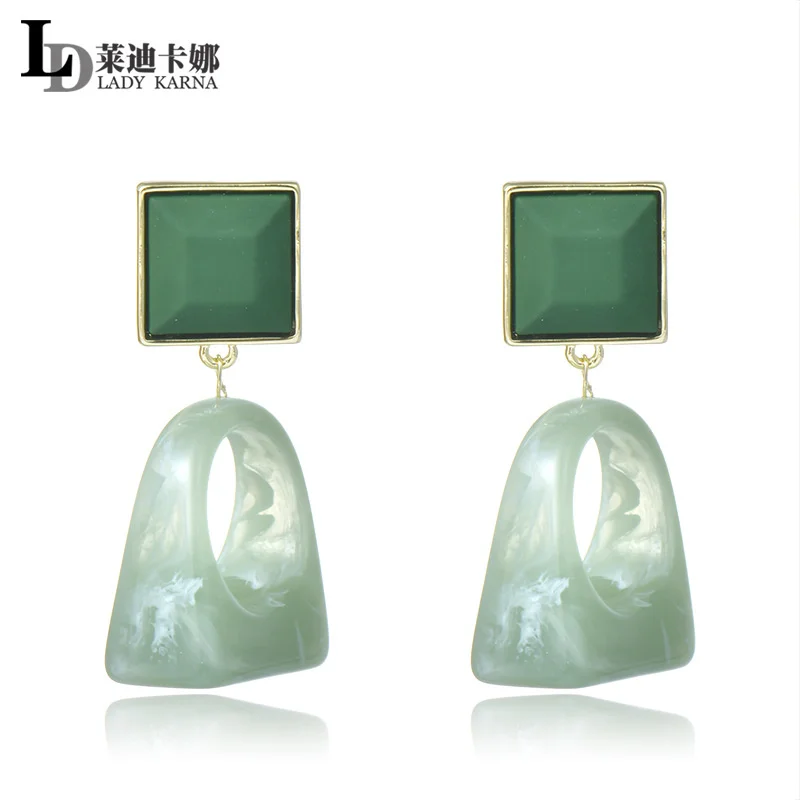 

Korean version of the cold wind resin ring ladies earrings niche design temperament personality 925 silver needle ladies earring